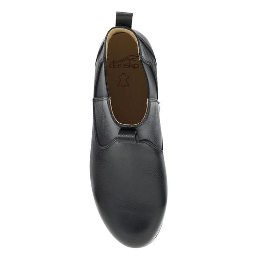 Black slip-on shoe with brand logo on a white background