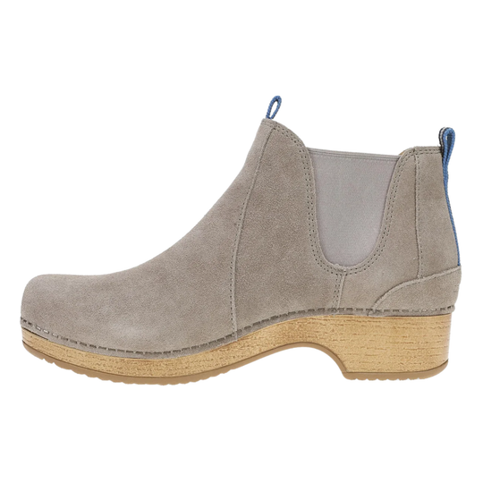 A single taupe suede Chelsea-style ankle boot with a natural wood wedge heel and a small blue pull tab, shown from a side profile on a white background.