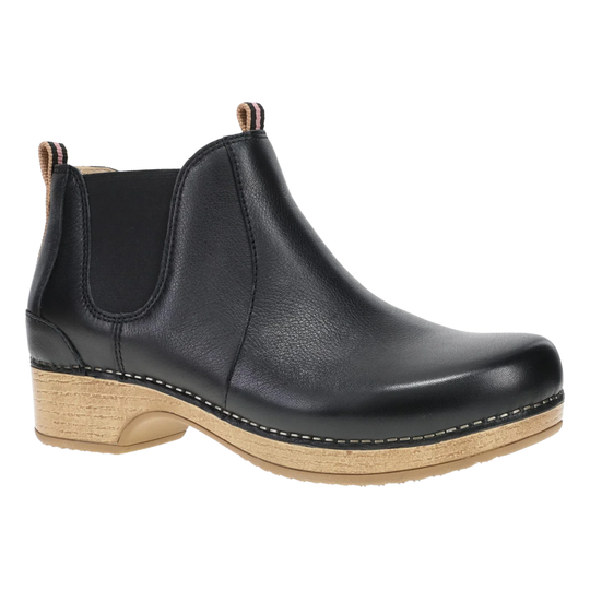 A black leather Chelsea-style ankle boot with a natural cork-wrapped wooden heel and a black elastic side gore, shown from a three-quarters angle on a white background.