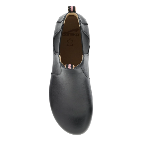 A single black leather slip-on shoe shown from a top-down view on a plain white background, with the interior lining and pull tab visible.