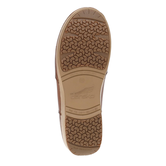 A top-down view of a shoe's brown rubber outsole, showing the tread pattern and the embossed brand name 'Dakota' on a white background.