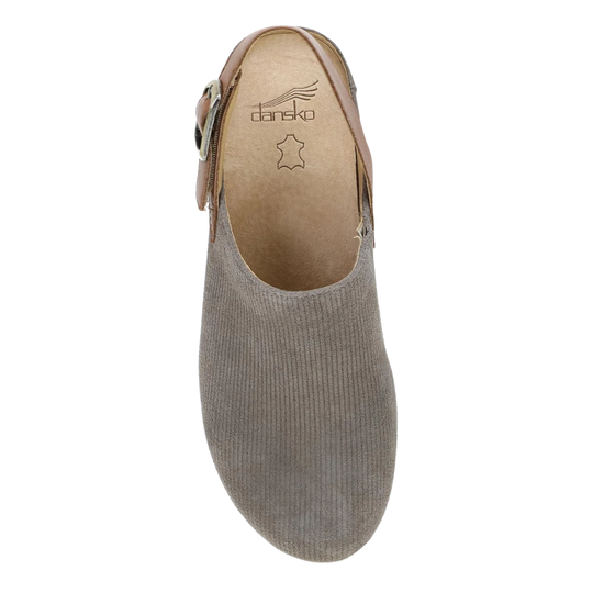 A single women's slip-on shoe shown from a top-down view, featuring a ribbed taupe-brown upper and a light tan insole with the 'dansk' brand logo printed inside.