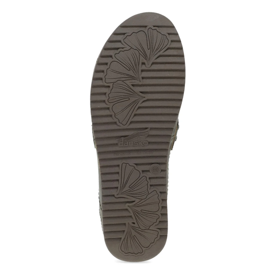 Brown rubber sole with wavy pattern on a white background