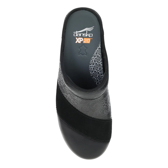 Black clog with decorative pattern on a white background