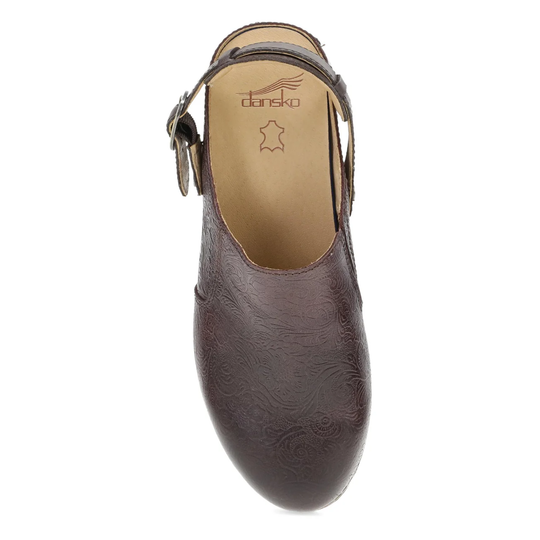 Brown clog with strap on a white background