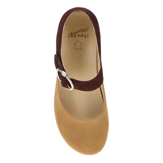 Tan sandal with brown strap and visible Danskos logo on a white background