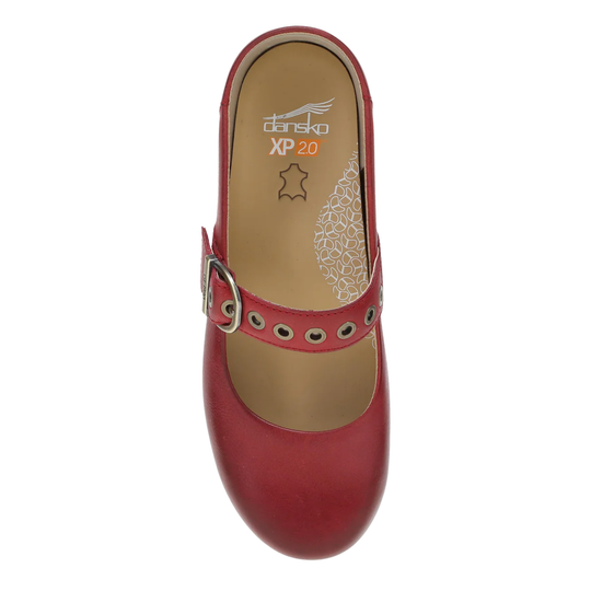 A single red leather mule shoe with a decorative strap and silver buckle, shown from a top-down view on a white background. The insole displays the brand 'donsko' and model 'XP 20'.