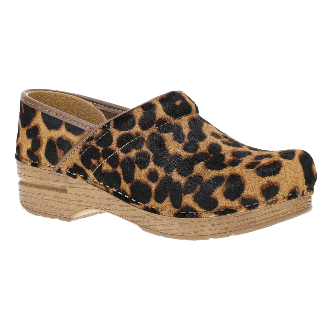 A single slip-on clog shoe with a brown and black leopard print upper and a light tan wood-look wedge sole, shown against a plain white background.