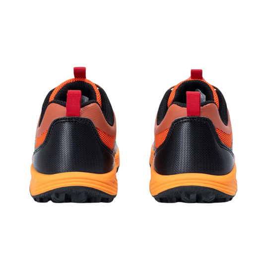 A pair of athletic trail running shoes shown from the rear, featuring a black textured synthetic upper with vibrant orange mesh panels, a red pull tab, and a thick orange and black sole.