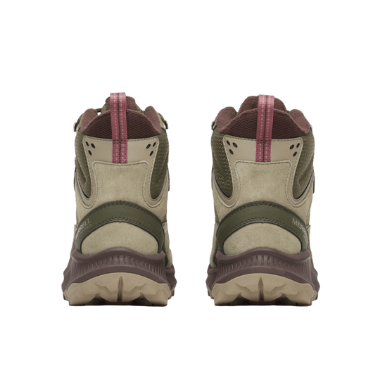 A pair of Merrell hiking boots shown from the back, featuring a beige suede and mesh upper with olive green panels, a dark brown midsole, and magenta pull tabs.