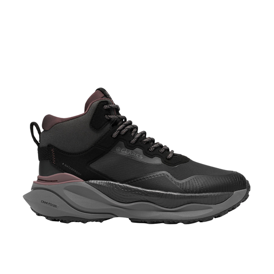 right side of black mid trail boot on white background