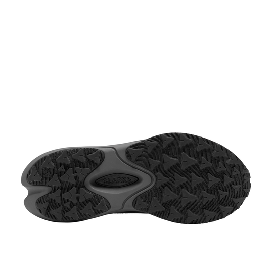 The outsole of a black athletic shoe, showing a textured tread pattern and a central logo embossed on a solid white background.