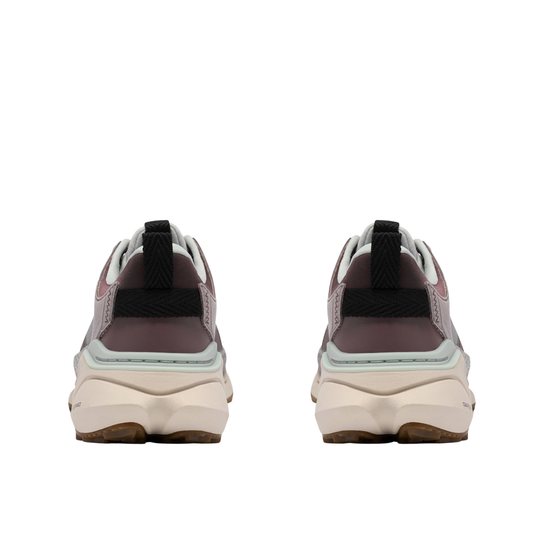 A pair of chunky platform sneakers shown from the back, featuring a dusty mauve upper, black heel pull tabs, a cream platform sole, and a light mint green midsole accent.