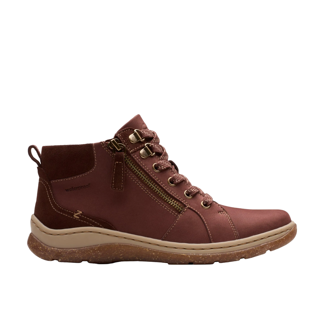 Brown leather boot with a zipper on a white background