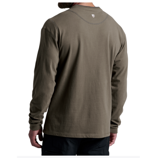 A man wearing a long-sleeve crewneck shirt in olive green, shown from the back against a plain white background.