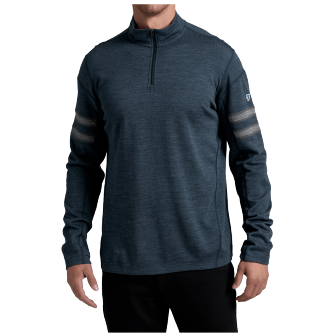 A man wearing a dark heathered blue quarter-zip long-sleeve shirt with gray stripes on the sleeves, shown against a plain white background.
