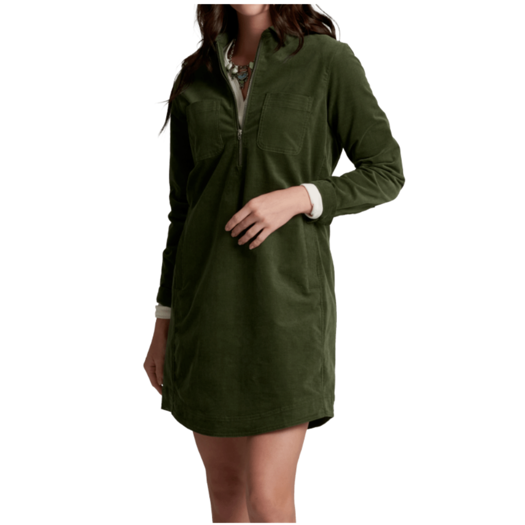 A woman wearing an olive green long-sleeve shirt dress with a half-zip neckline, chest pocket, and side pockets, shown against a plain white background.