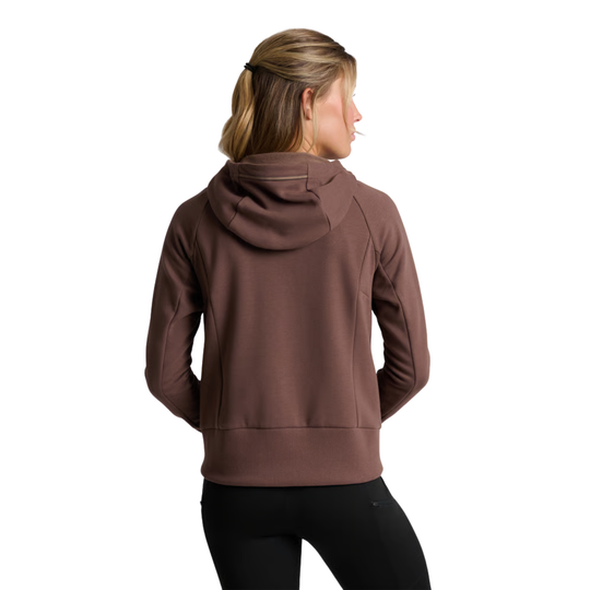 A woman shown from the back wearing a brown hooded sweatshirt and black leggings against a plain white background.