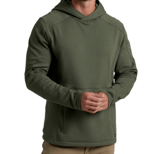 An olive green hooded sweatshirt worn by a model, shown from the neck down against a plain white background.