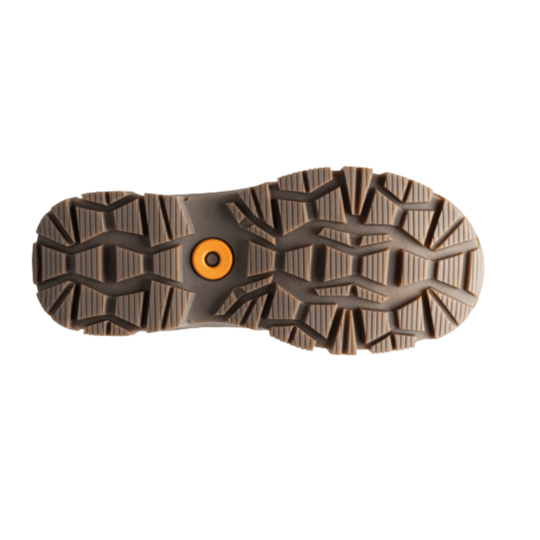 The treaded outsole of a brown boot or shoe, featuring a textured geometric pattern and a small orange circular accent near the center, shown against a plain white background.