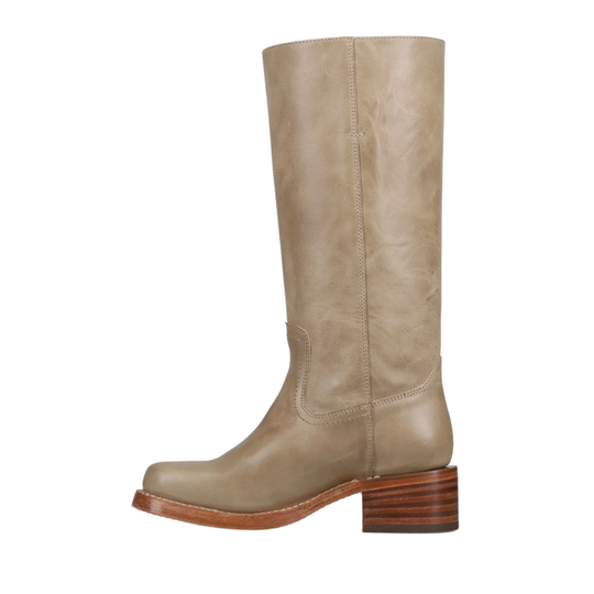 A single mid-calf leather boot in a taupe-beige color, featuring a stacked brown wooden heel and a low rounded toe, shown against a plain white background.