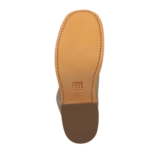 Top-down view of a shoe sole showing a tan leather insole with visible stitching and the embossed brand name 'FRYE' on a white background.