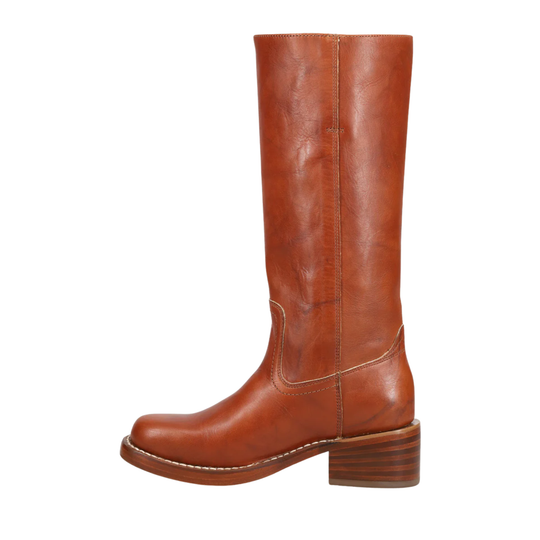 A single mid-calf leather boot in a warm cognac brown color, shown from a side profile view against a plain white background.