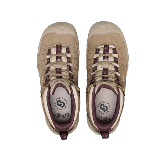 A pair of Keen mid-height hiking boots in beige and maroon, shown from a top-down view on a white background.
