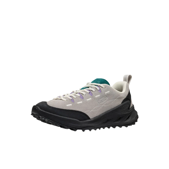 A light gray and black trail running shoe with white laces, a teal tongue label, and a black rugged sole, shown against a plain white background.