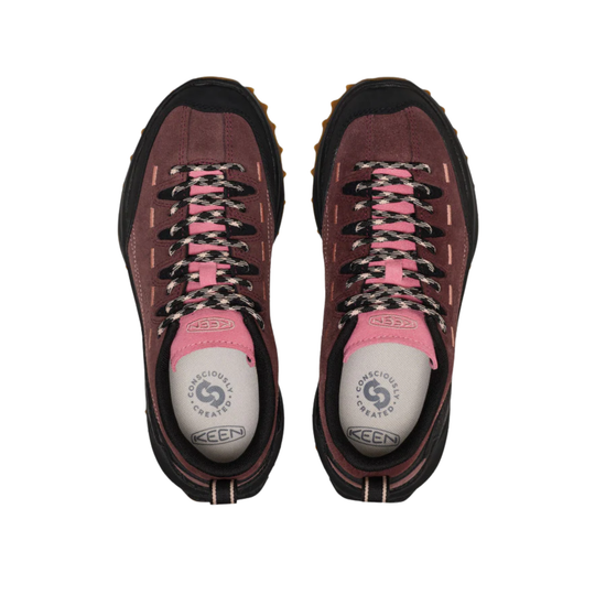 A pair of KEEN hiking shoes shown from a top-down view, featuring a dusty burgundy suede upper, black and pink laces, and a white KEEN logo on the insole.