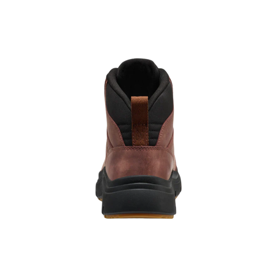 A single mid-height ankle boot shown from the back, featuring a brown leather upper with black panels, a black pull tab, and a thick black sole with a small tan outsole edge, set against a plain white background.