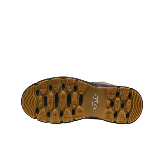 A top-down view of a brown and black outdoor boot sole, showing the tread pattern and the embossed Kenda logo, on a solid white background.