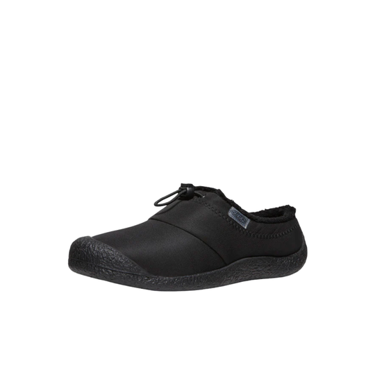 A single black slip-on shoe with a textured sole and a small gray brand tag on the side, shown against a plain white background.