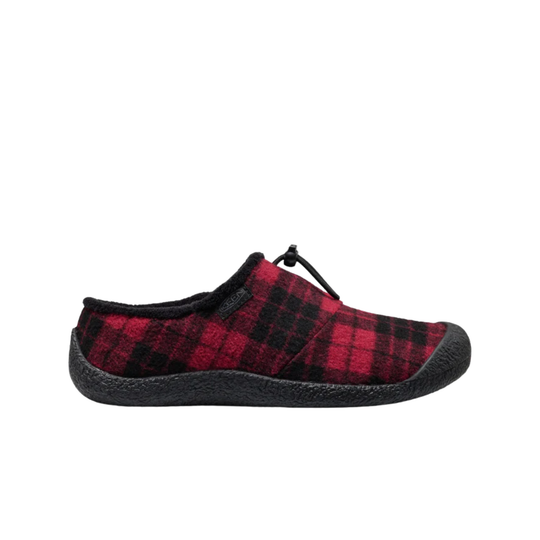 A single slip-on slipper with a red and black plaid pattern on the upper, a black sole, and black laces, shown against a plain white background.