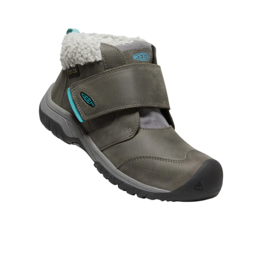 A single Keen brand winter boot in dark gray suede with a white sherpa lining, a gray and black sole, and turquoise accents on the strap and heel pull tab, shown against a plain white background.