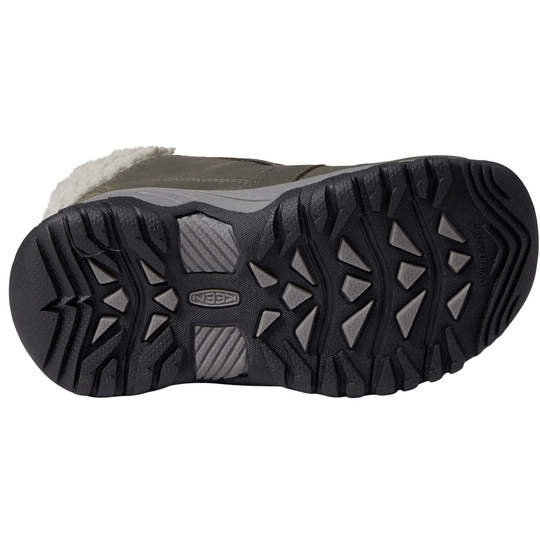 A close-up bottom view of a Keen snow boot showing the black treaded outsole with a gray logo and a light gray suede upper with white faux-fur trim.
