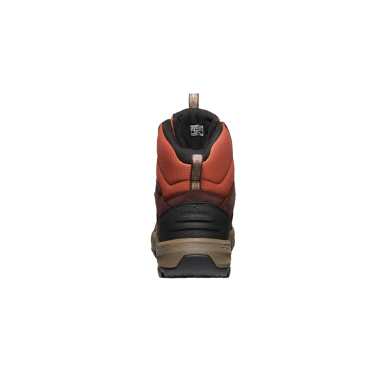 A single mid-height hiking boot shown from the rear on a solid white background, featuring a rust-orange and black upper with a tan sole.