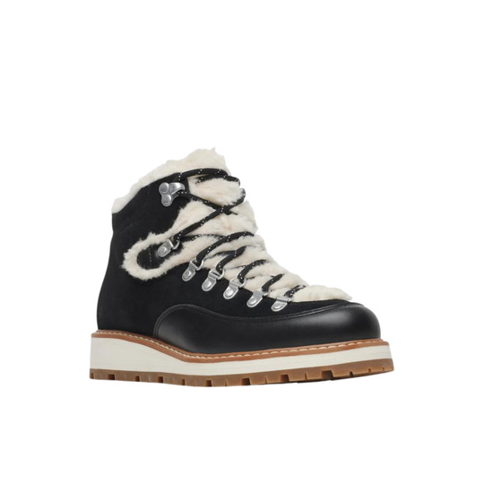 A single mid-height lace-up boot with a black leather upper, white faux-shearling lining, white laces, silver metal eyelets, and a thick white and brown sole, shown against a plain white background.