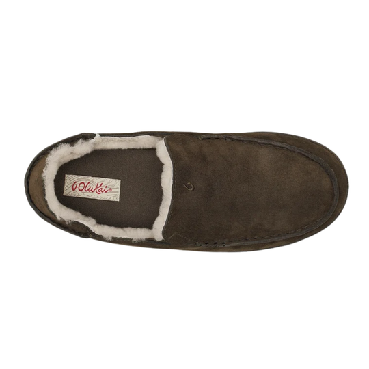 A single dark brown suede slipper with a white shearling lining, shown from a top-down view on a white background. The brand label 'Old Wagon' is visible on the inner sole.
