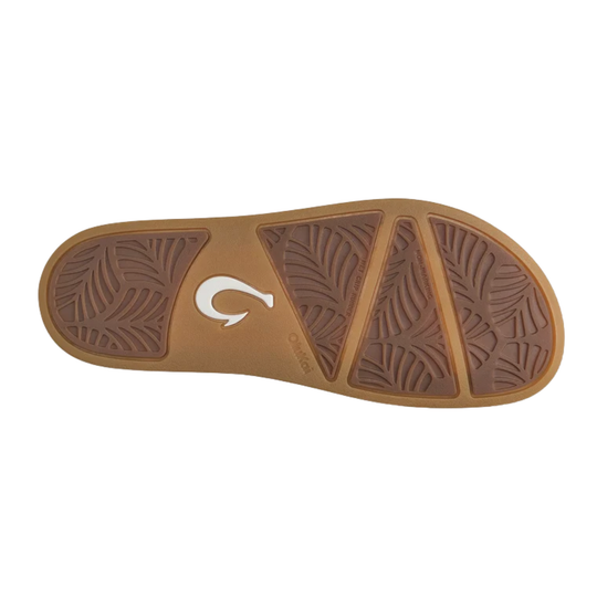 The outsole of a brown rubber sandal, showing a textured tread pattern and a white stylized logo, on a plain white background.