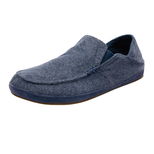 A single slip-on loafer in textured blue felt with a matching blue sole, shown from a side profile on a white background.