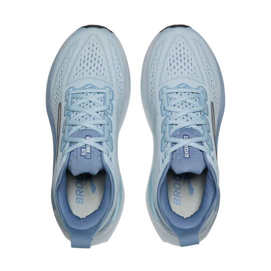 A pair of light blue Brooks running shoes shown from a top-down view against a solid white background.