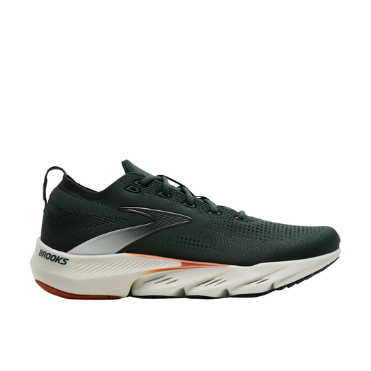 Brooks running shoe in dark forest green with a white midsole, a metallic silver logo, and a small orange accent on the outsole.