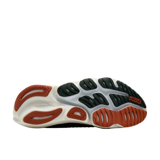 Green/grey/brown Brooks sole on a white background