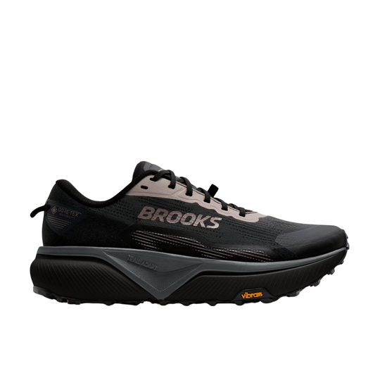 A single black suede lace-up shoe shown in profile against a plain white background.