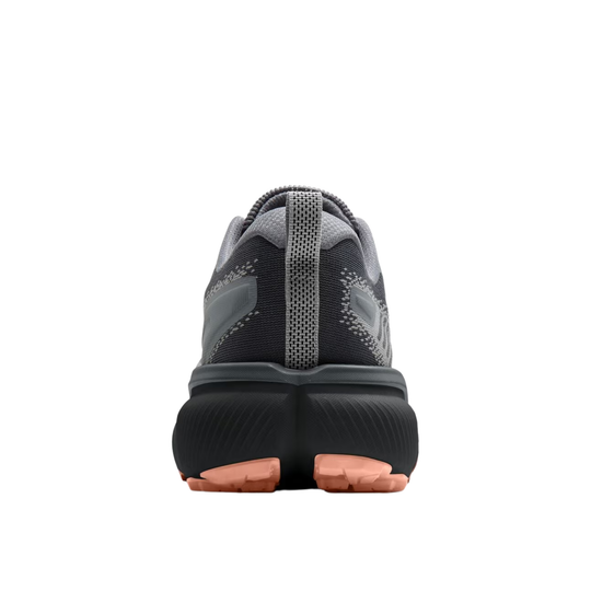 A rear view of a dark gray and black athletic shoe with a thick black sole and orange outsole tips, shown against a plain white background.