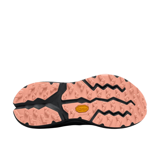 The outsole of a hiking shoe, showing a split-design tread with a peach-pink and black rubber pattern and a central Vibram logo.