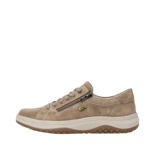 A single low-top sneaker shown in profile against a solid white background. The shoe is made of light brown suede with a matching brown laces and sole, featuring a white midsole and a black zipper with a small gold metal accent.