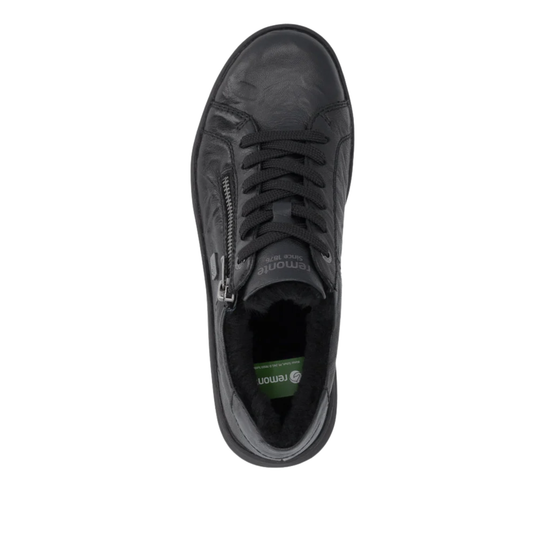 A black leather sneaker with a side zipper, black laces, and a black sole, shown from a top-down view on a white background.