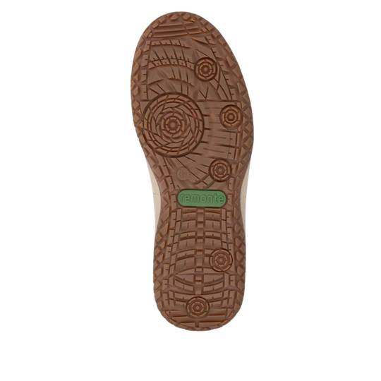 The outsole of a shoe, showing a brown textured tread pattern with a small green 'clemente' brand logo in the center, isolated on a white background.